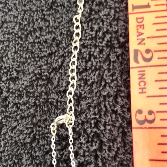 Heart bling dime size w/solid back with slight rub marks on back. Silver color. - Picture 13 of 15